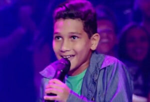Kaio Fernandes no The Voice Kids A voz do pequeno Kaio Fernandes conquistou a todos, hoje (26), durante a etapa da ...